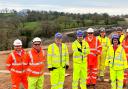 Pictured at the A40 construction site at Penblewin Roundabout are Adam Bateman, Rhodri Gibson, Marc Tierney, Paul Miller, David Parr, Andrew Davies, Eluned Morgan MS, Terry Wright and Emma Thomas.
