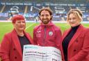 Jackie Gilderdale and Madison Owen pictured with Joe Allen