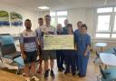 Llyr, Guto and Marc donated £27,500 to the unit. Picture: Hywel Dda Health Charities