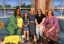 Nyfain, Lowis and their mother Kelly, sharing the 'Good Morning' sofa with Holly Willoughby and Alison Hammond.