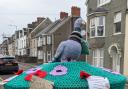 The Milford Yarn Bomber's magnificent postbox topper