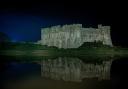 Carew Castle at night