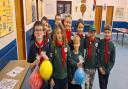 Jack, far left, raised more than £100 to buy new equipment for his scout group.