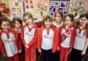 Young Rainbows in the uniform to mark World Thinking Day