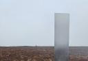Welsh builder, Mr Craig Munir takes a picture of the shiny silver monolith he thought was a 'UFO'