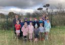A number of children, including Rory's son and daughter, helped Ms Russell to plant the trees