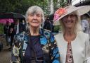 Solva Care founder Mollie Roach, left, and coordinator Lena Dixon on the right at the garden party at Buckingham Palace.