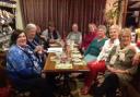 Joan Giles, third from right, is pictured with supper guests at the annual Pies, Pints & Tarts.