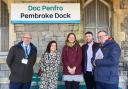 Arriva Trains Wales Manager Ben Davies is pictured with with Labour AM Eluned Morgan, Town Councillor Dilys Burrell, County Councillor Josh Beynon and Community campaigner, Marc Tierney at Pembroke Dock Railway Station.