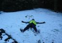 Either 'how to do a snow angel', or 'that really was a hard run!'