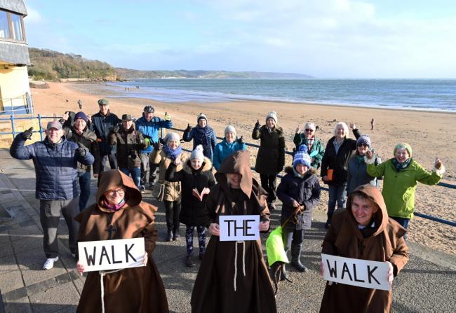 The motivational monks and  fellow Walk to Walk challengers celebrate their successful  November. Picture: Gareth Davies Photography