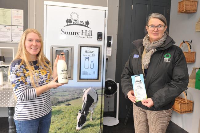 Agriculture student and farmer Annie Peters (left) of Sunny Hill Farm Dairy, Crundale, near Haverfordwest and Farming Connect Agrisgôp leader Lilwen Joynson, at the family’s new milk vending machine