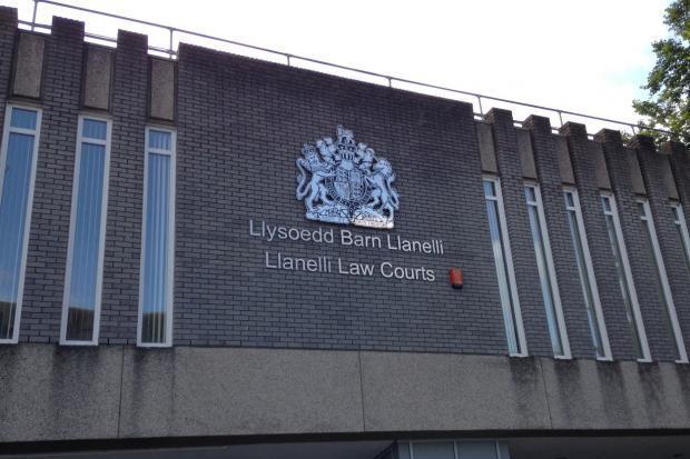 The defendant was driving a BMW when stopped in Aberystwyth.