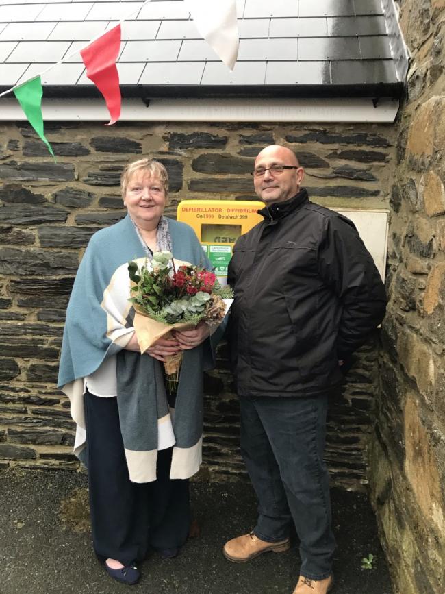 Steve and Scilla Nicholls are pictured with the new defibrillator