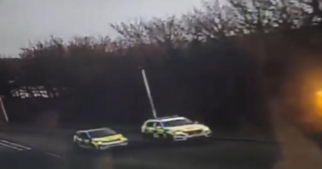CCTV footage appears to show the two police cars 'drag racing' up a residential street on the Mount Estate, Milford Haven