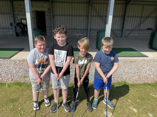 Western Telegraph: Champion golfer of the week was Ronan (far left), pictured here with his team of Joseph, Frankie and Owen