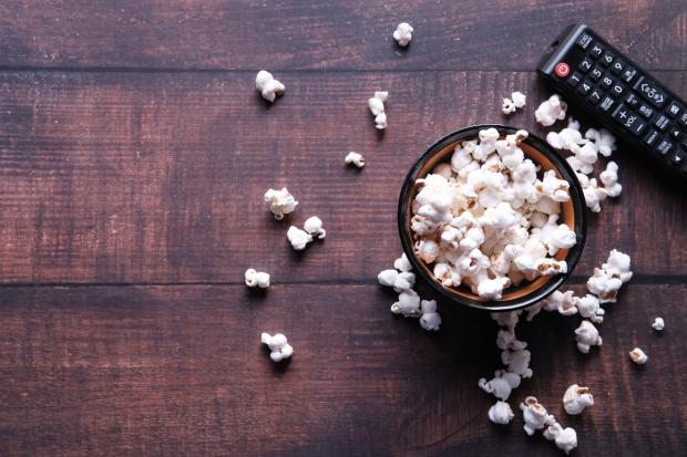Western Telegraph: A bowl of popcorn and a TV remote (Canva)