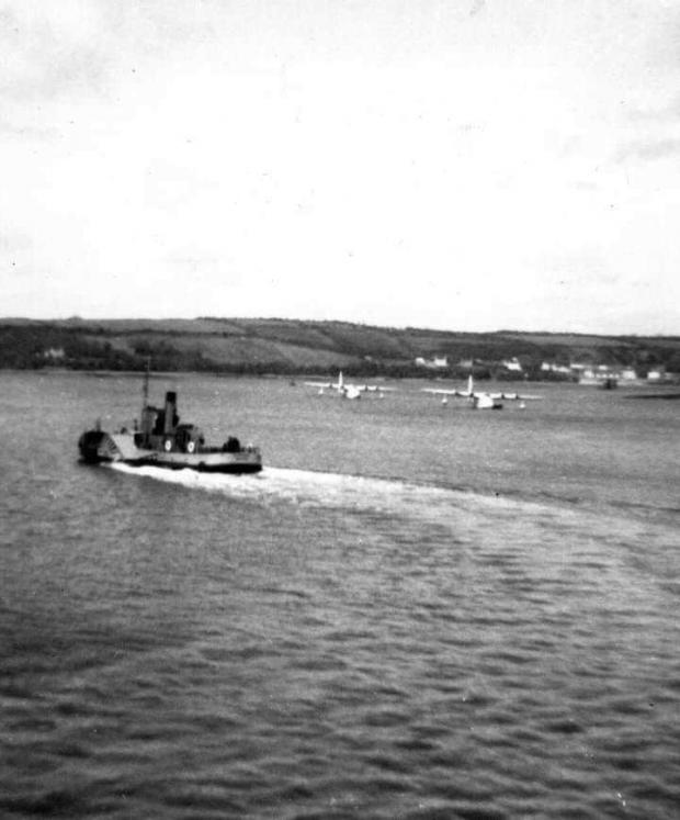 Western Telegraph: Paddle steamer and two Sunderlands in the 1940s or 50s. Picture: Greg Ralph via Our Pembrokeshire Memories