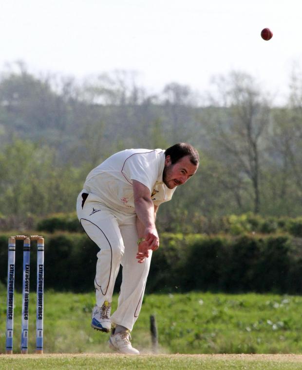 Western Telegraph: Sam Harts 3 for 18 bowling for Carew against Lawrenny. Photo Susan McKehon