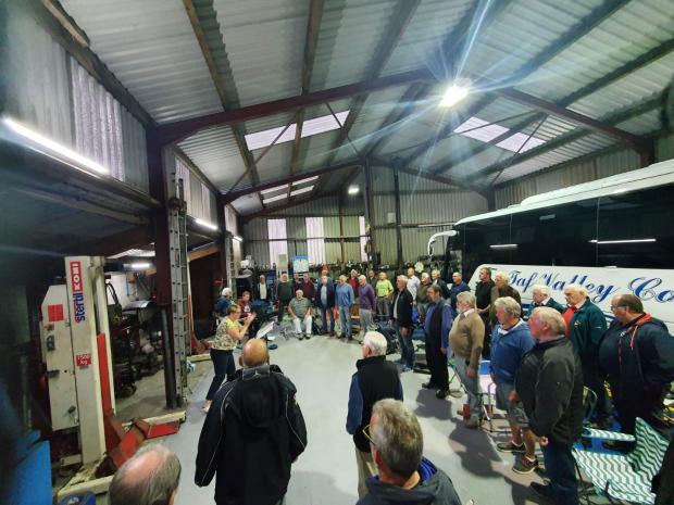 Western Telegraph: A workshop at Taf Valley Coaches was an unusual rehearsal location