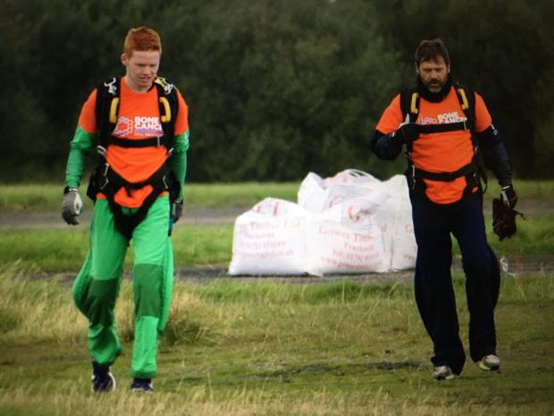 Western Telegraph: Phil Langston's son Darcy Langston (left) is one of 12 people taking part in the skydive