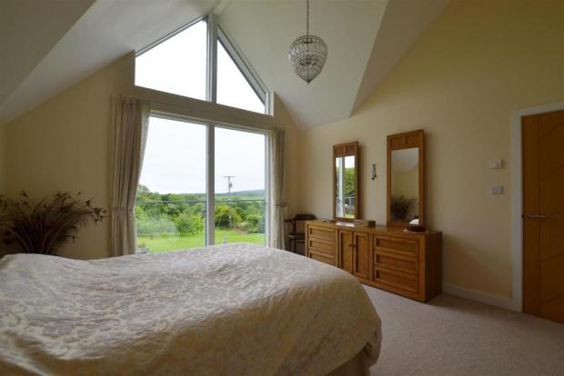 Western Telegraph: The master bedroom. Picture: West Wales Finest Properties
