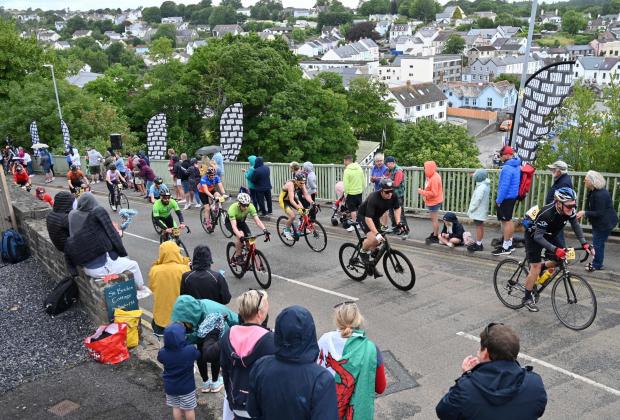 Western Telegraph: Supporters lined St Bride's Hill to encourage the cyclists to the top. Picture: Gareth Davies Photography