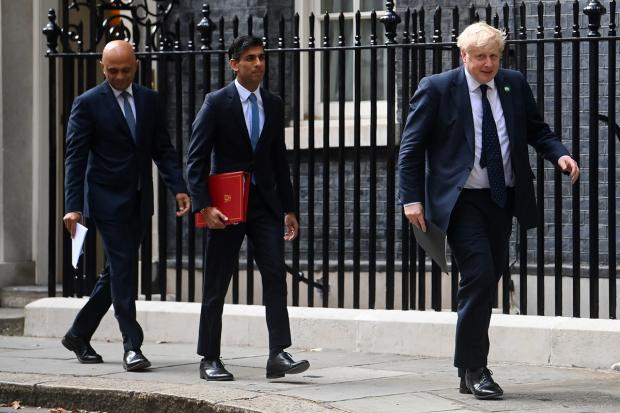 Western Telegraph: Sajid Javid and Rishi Sunak have both resigned from Prime Minister Boris Johnson's government this evening. Picture: PA