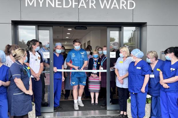 James 'Cubby' Davies cuts the ribbon to mark the opening of the £1m extension at Werndale Hospital,  Bancyfelin