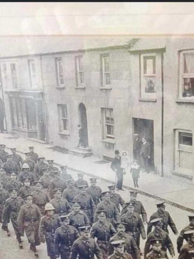 Western Telegraph: Soldiers marching down Law Street, Haverfordwest during the First World War.  Photo: Nathan Harvey
