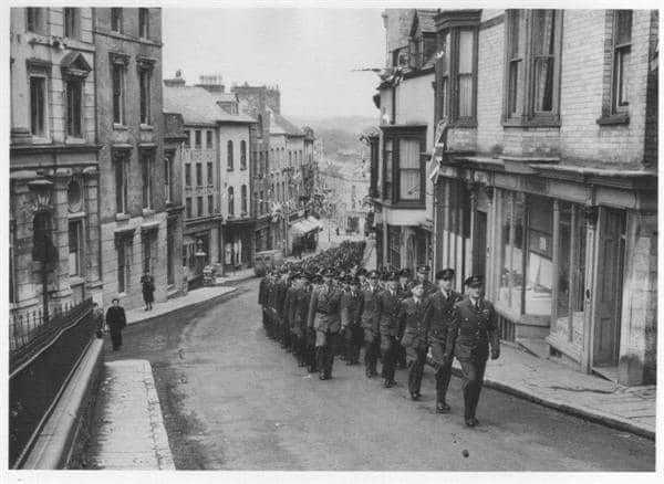 Western Telegraph: Soldiers marching down High Street, Haverfordwest circa 1940/50.  Photo: Samantha Dalton