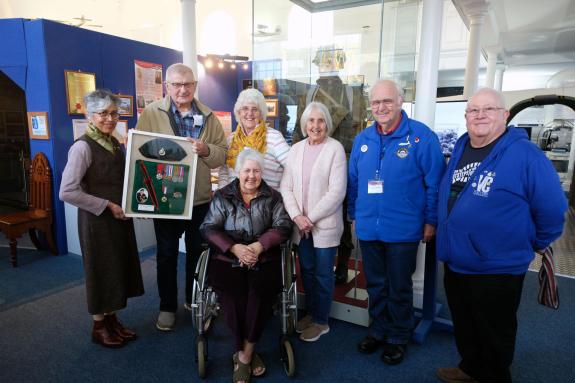 Western Telegraph: Pictured with the Ted Owens framed display are, left to right: Shobha Edgell, Wyn Owens, Gloria Elford, Margaret Black, Liz Halsted, Graham Clarkson, chairman of the Heritage Trust, and Kevin Stanley of the VC Gallery. Western Telegraph: Pictured with the Ted Owens framed display are, left to right: Shobha Edgell, Wyn Owens, Gloria Elford, Margaret Black, Liz Halsted, Graham Clarkson, chairman of the Heritage Trust, and Kevin Stanley of the VC Gallery.