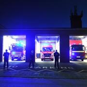 Pictured are Pembroke Dock Fire Station fire officers paying their tribute.
Picture: Martin Cavaney