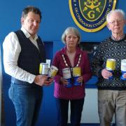 Jeremy Martineau and Mark Rummery from North Pembrokeshire Trade and Tourism with Fishguard mayor, Jackie Stokes and the Red Cross DEC collecting boxes