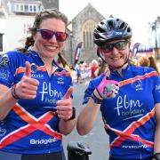 The smiles say it all! Two very pleased Carten cyclists after crossig the finishing line in Tenby. Picture: Gareth Davies Photography