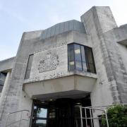 David Round will face a trial at Swansea Crown Court.