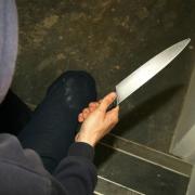 A man took a kitchen knife to a police station in the early hours of the morning in a cry for help.