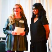 Diana Powell, from Mathry  (left) is presented with the prestigious 2022 Bristol Short Story Prize