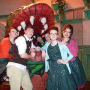 Don't feed the plant. Some of the talented cast of Little Shop of Horrors at Ysgol Bro Gwaun.