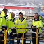 (left to right) Secretary of State for Wales David TC Davies, Stena Line chief operating officer Fleet and Government Affairs Ian Hampton, Prime Minister Rishi Sunak and First Minister of Wales Mark Drakeford during a visit the Port of Holyhead in