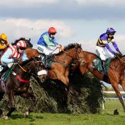 Corach Rambler ridden by Derek Fox (right) on their way to winning the Randox Grand National Handicap Chase during day three of the Randox Grand National Festival at Aintree Racecourse
