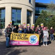 The protest at County Hall, Haverfordwest, calling for the immediate dismissal of Cllr Andrew Edwards, accused of making racist 'slave' comments