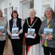 The official launch of Owen Vaughan's book The Headstones and Memorials of Garrison Cemetery, Pembroke Dock. Picture: Martin Cavaney