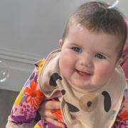 Mabli Cariad Hall's parents said they “will always remember her beautiful little smile”.