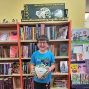 Riley is one of the youngsters benefitting from the football library scheme which is across Wales, including Pembrokeshire. Picture: Morrisons