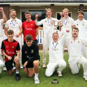 A jubilant Carew team celebrate winning the  2023 Alec Colley Cup