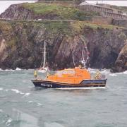 Angle RNLI attending a call-out to assist a stranded yacht.