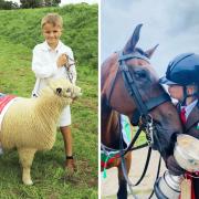 A happy day at Martletwy Show for these two youngsters - Osian Jenkins with his supreme champion sheep, Ana, and Chloe Owen with working hunter champion Moonraker.
