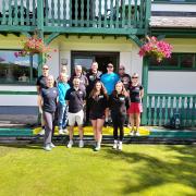 Members of the Sport Pembrokeshire team are pictured at Saundersfoot Bowling Club with club secretary, Paul Blayney.