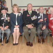 Duncan Hilling (third left) and Tony Bird (fourth right) were among Second World War veterans at a special event this week.